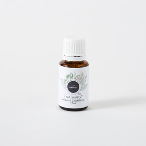 i am sniffly essential oil blend in 15ml amber bottle wiht white lid, white label and botanical logo