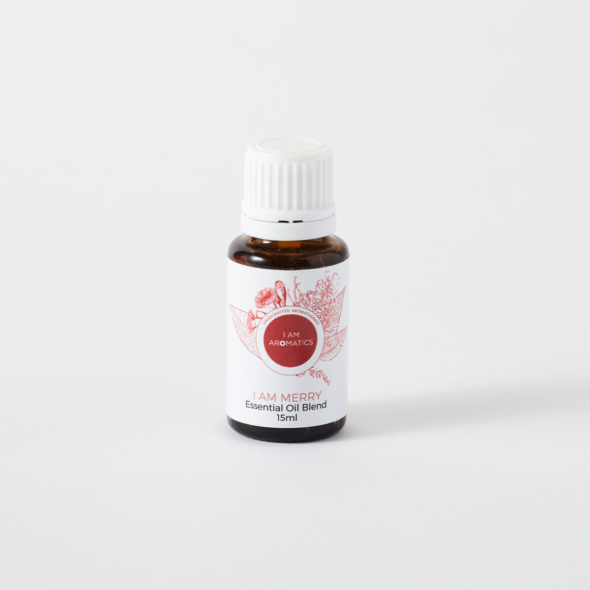 Merry essential oil blend, 15ml amber bottle, with white lid, white label, deep red botanical logo and font