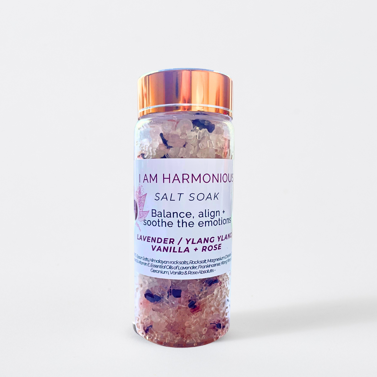 Jar of 'I Am Harmonious' salt soak with a white label on a light background