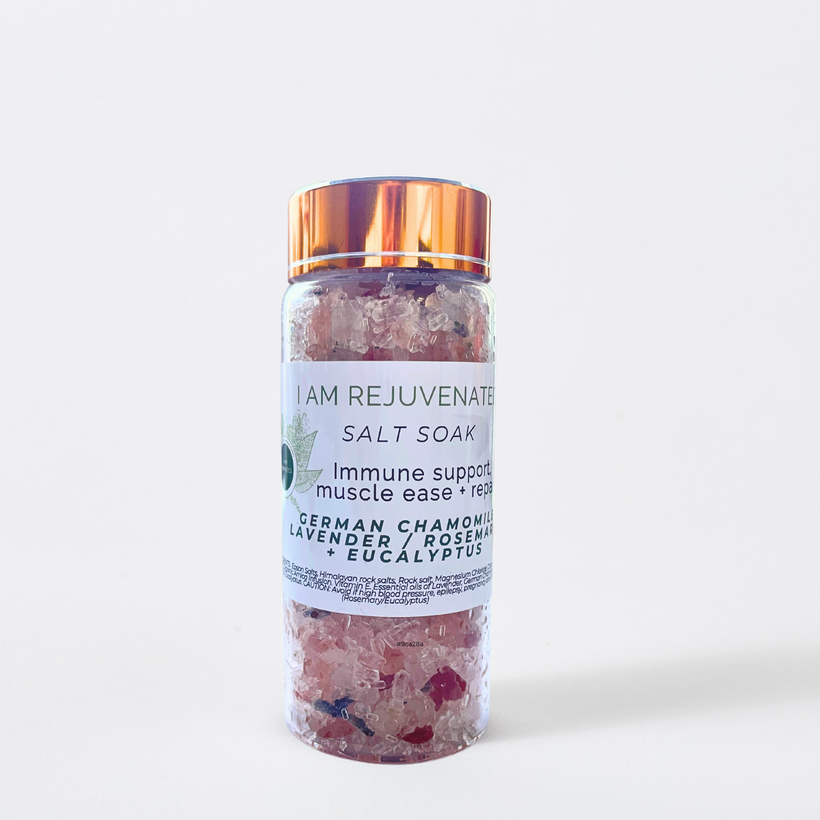 Jar of 'I AM REJUVENATED' salt soak with a white label on a light gray background