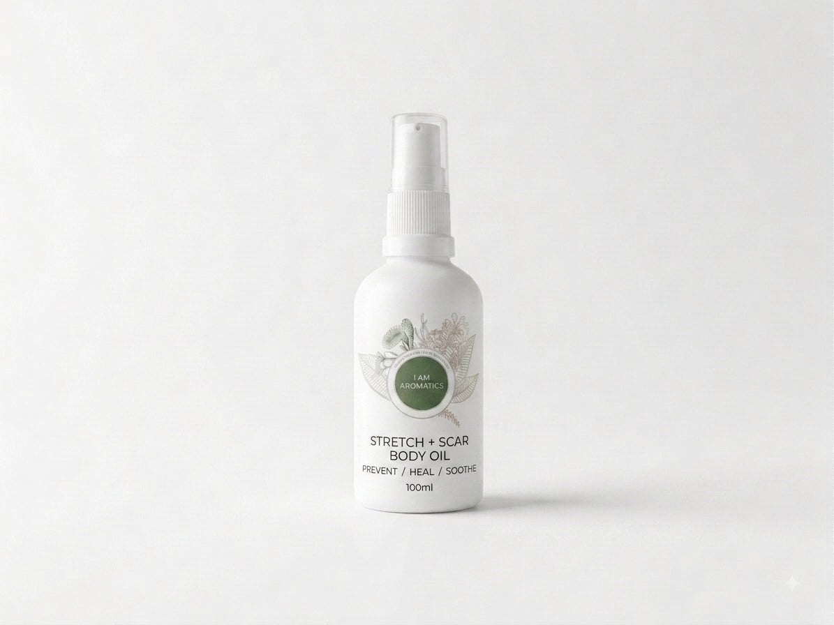 I Am Aromatics Stretch & Scar Body Oil with rosehip and helichrysum, shown in a clear bottle, ideal for pregnancy and scar care.