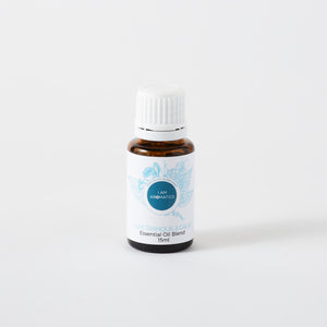 Tranquil & calm essential oil blend in 15ml amber bottle with white lid, white label and blue botancial logo