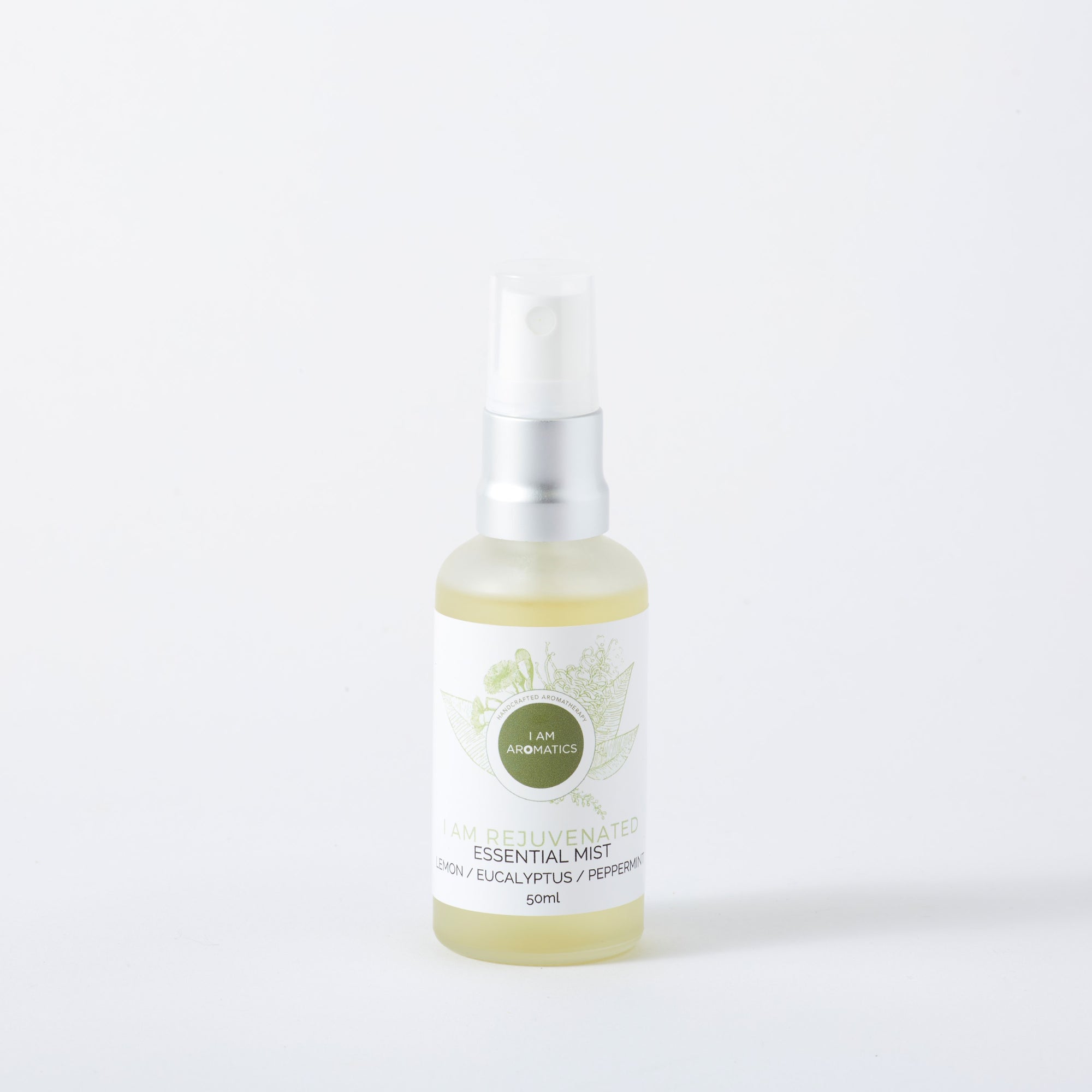 Rejuvenated essential mist in frosted glass bottle 50mls with matt silver atomiser, white lable with green botaonical logo