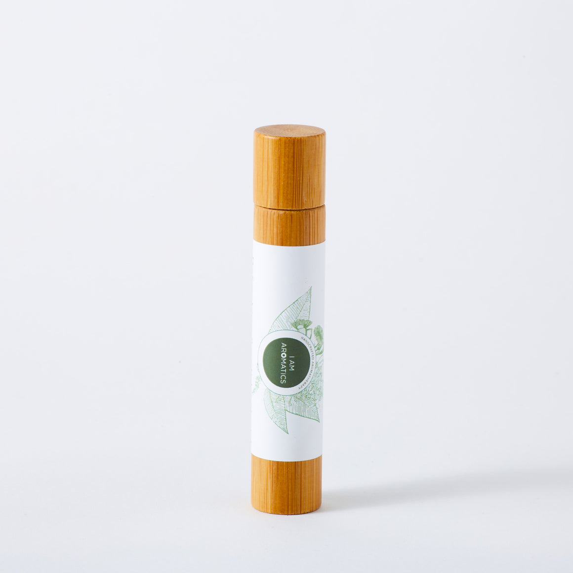 rejuvenated natural perfume in 10ml bamboo roller, white label with green botanical logo