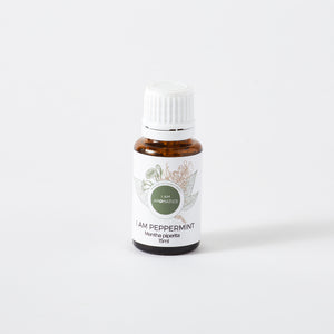 Peppermint essential oil in 15ml amber bottle with white label and white lid, botanical logo