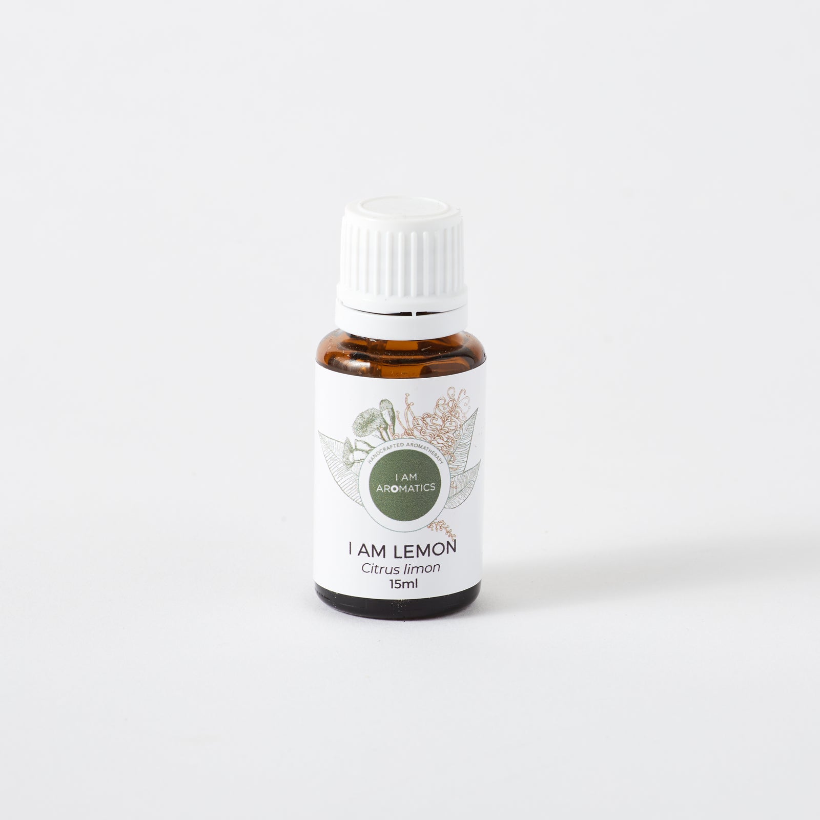 lemon essential oil 15ml amber bottle with botanical logo