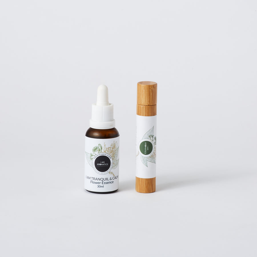 flower essence in 30ml amber bottle with white droper lid, alongside tranquil natural perfume in 10ml bamboo roller.