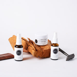 Beard oil, face & shave oil, face cream pictured with beard comb and razor