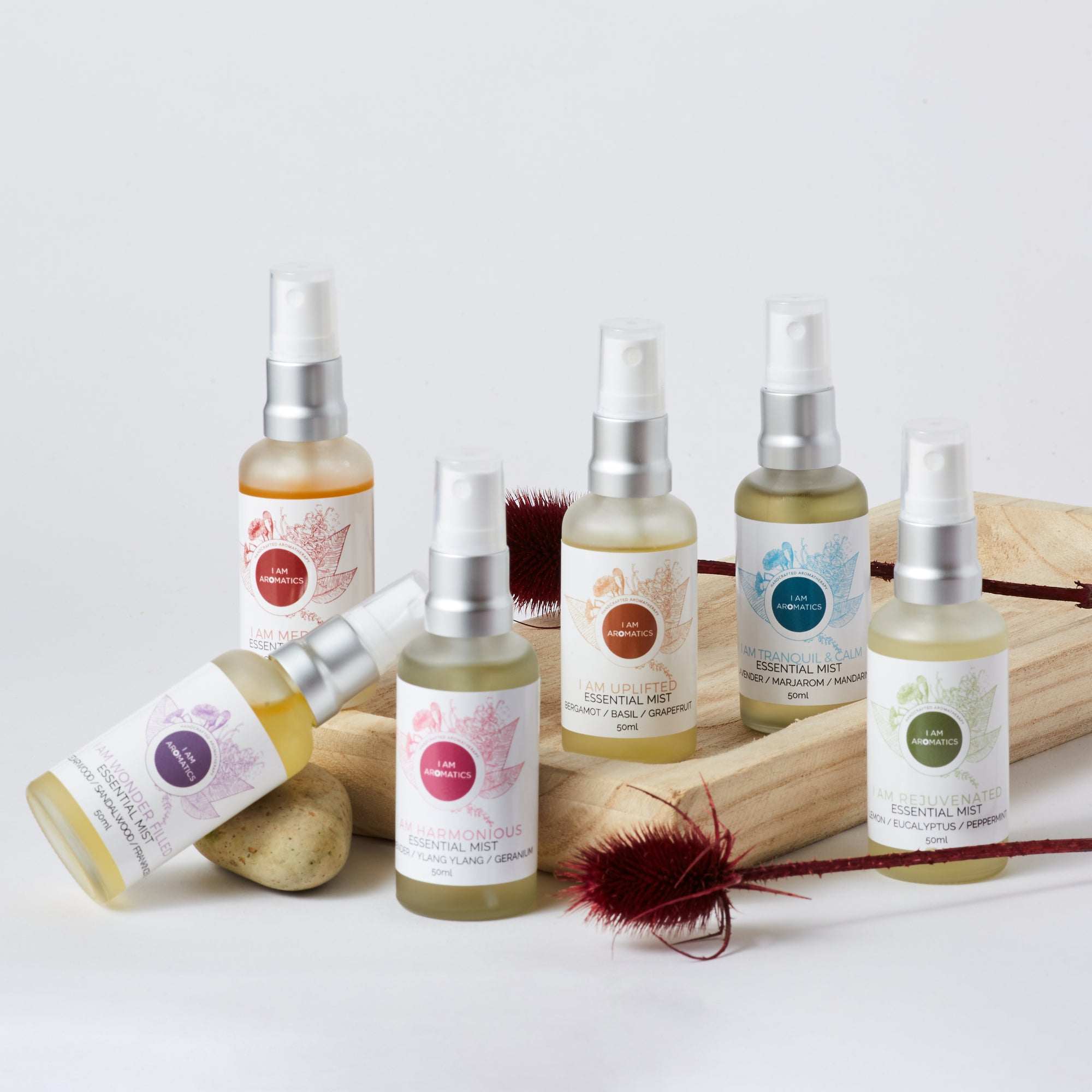 I am harmonious essential mist 50mls, frosted glass bottle with matt silver atomiser, pink logo, pink font