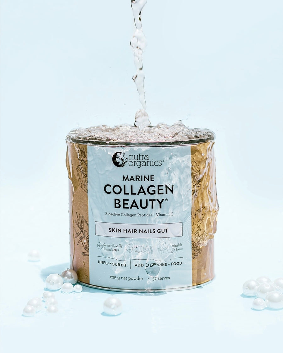 blue container of marine collagen beauty with water dropping over the top.